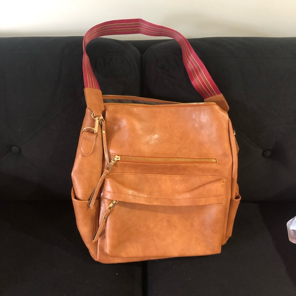 Light brown convertible backpack